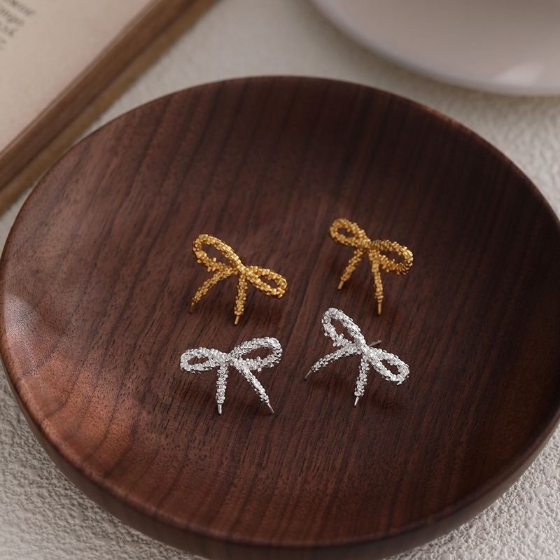 Women Simple Sterling Silver Hollow Bow Stud Earrings